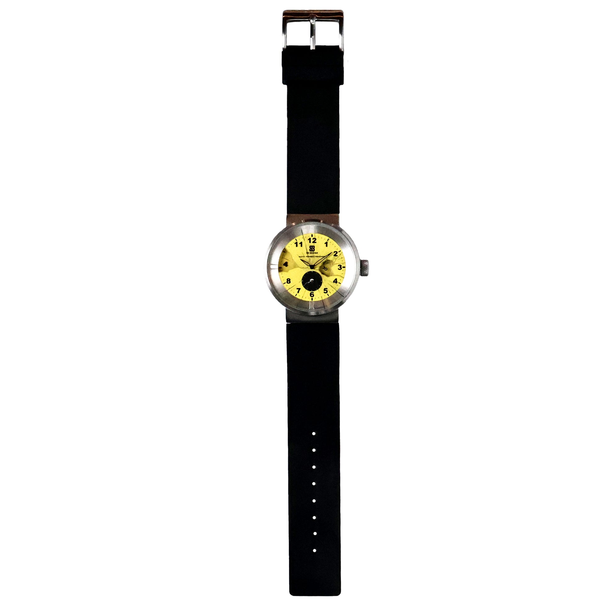 Wristwatch with yellow dial and black numbers glass painted to look as if it is cracked and a stainless steel case and a black silicone band on a  background Broken Time Watch Brad Podray Mad Hudson