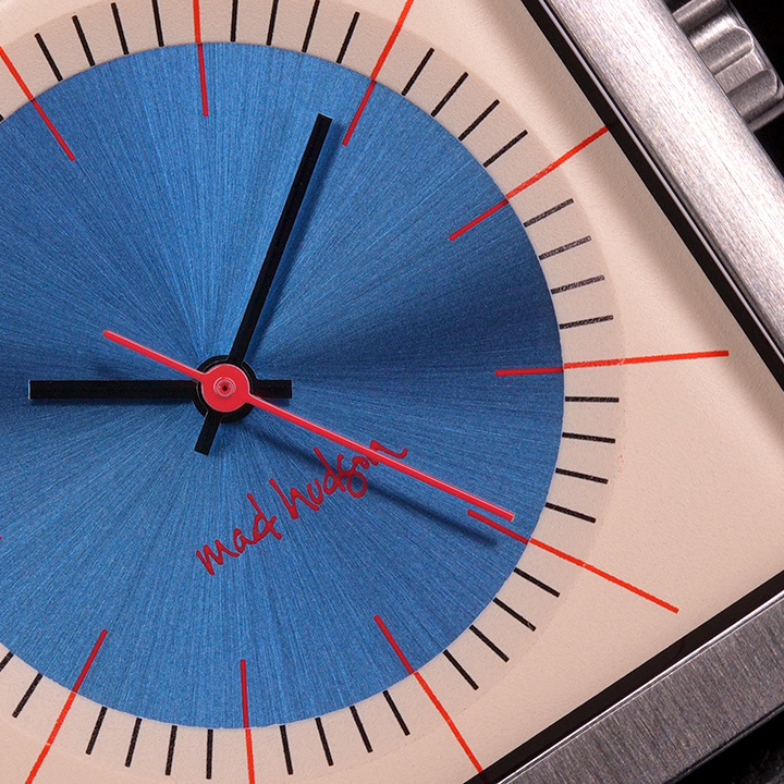 Eddie Wristwatch with stainless steel case , tan and blue face steel and red hands red hour marks black minute marks mad hudson watches