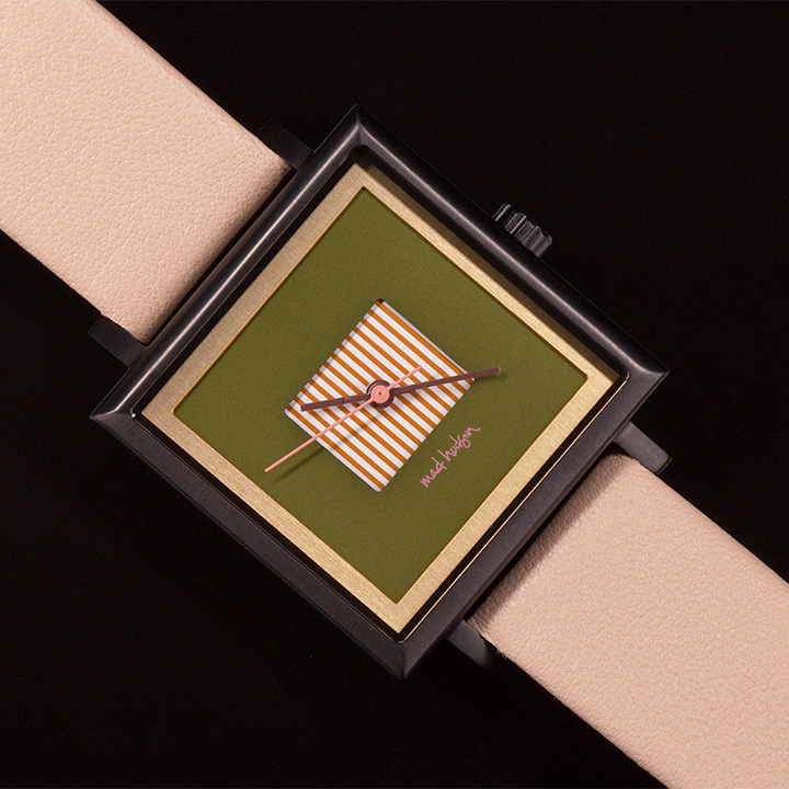Square watch with green face and beige strap on a black background. Black stainless steel square case, beige leather band. Layered design with a gold frame. Engraved case back. Adjustable Strap. The Marshall Watch Mad Hudson Watches